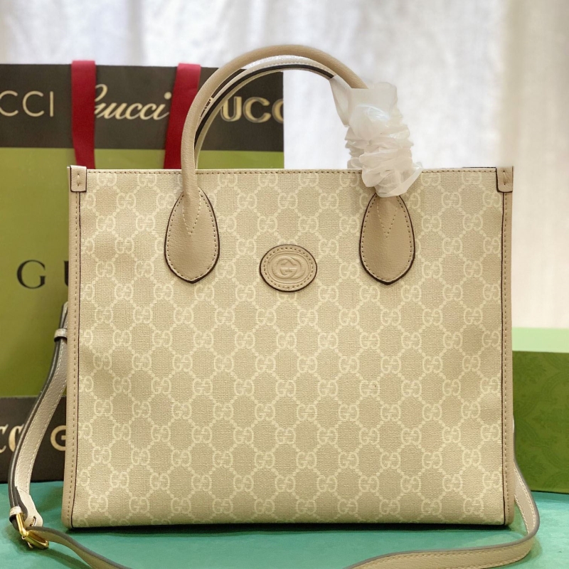 G*u*i shopping bags